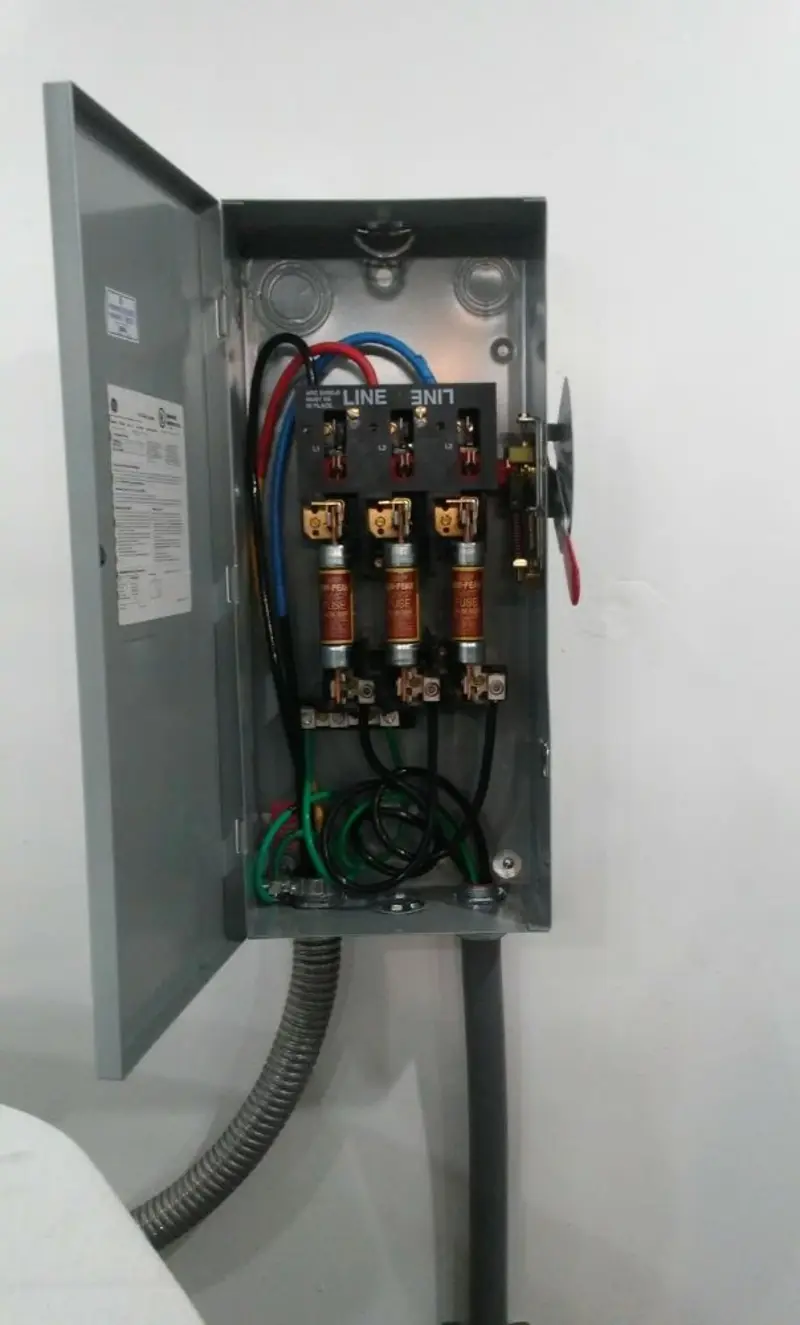 Three-phase disconnect switch installed for Smoke Detector Installation in Crete